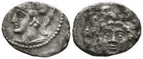 CILICIA. Uncertain mint.(Circa 4th century BC)
AR Obol (11,3mm 0,55g)
Obv: Facing gorgoneion
Rev: Head of Athena to left, wearing crested Corinthia...