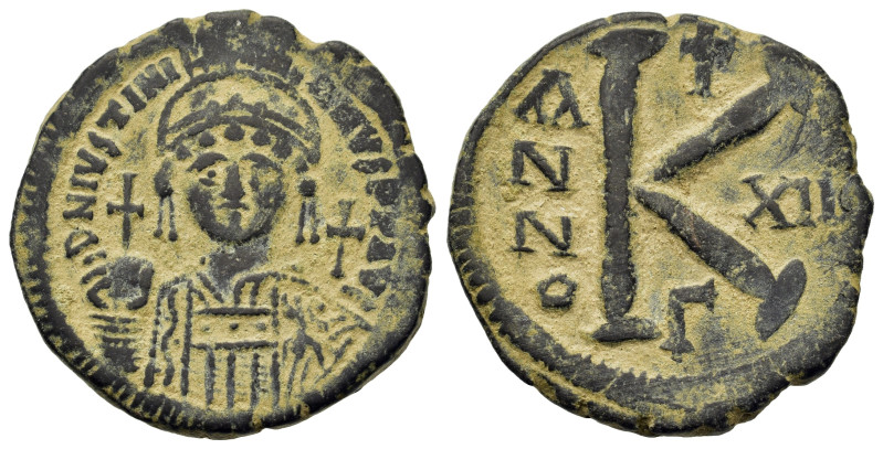 Justinian I (527-565). Æ 20 Nummi (27,8mm, 11.6g). Constantinople; RY 12 (538/9)...