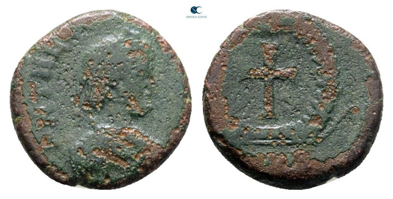 Theodosius II AD 402-450. Uncertain mint
Nummus Æ

12 mm, 1,23 g



Fine