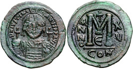 BYZANZ. 
IUSTINIANUS I. 527-565. AE-Follis 40mm (538/540) 22,65g, Konstantinopel, 5. Offizin. Büste mit Panzer, Helm, Schild und Kreuzglobus v.v.; r....