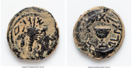 JUDAEA. Jewish War (AD 66-70). AE eighth-shekel (19mm, 4.68 gm, 11h). Fine, altered surfaces. Jerusalem, dated Year 4 (AD 69/70). Year Four (Paleo-Heb...