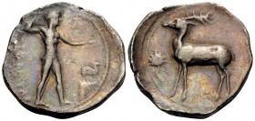 BRUTTIUM. Kaulonia. Circa 420-410 BC. Stater (Silver, 22.5 mm, 7.67 g, 3 h). KAYΛΩNIATAΣ Apollo, nude, his hair bound with a taenia, advancing to righ...