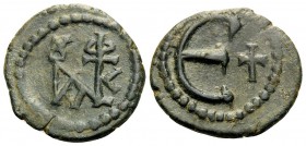 Justin II, 565-578. Pentanummium (Bronze, 15 mm, 1.69 g, 4 h), Constantinople. Monogram of Justin II and Sophia. Rev. Large Є; to right, cross. DOC 60...