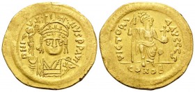 Justin II, 565-578. Solidus (Gold, 21 mm, 4.37 g, 6 h), Constantinople, 6th officina (ς), 567-578. D N IVSTINVS PP AVI Diademed, helmeted and cuirasse...