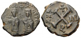 Phocas, 602-610. Decanummium (Bronze, 16 mm, 2.30 g, 6 h), regnal year III (3) = 604-605. [O N FOCA] NЄ PЄ Λ Phocas and Leontia standing facing, holdi...