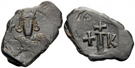 Constantine IV Pogonatus, 668-685. Decanummium (Bronze, 28x18 mm, 4.99 g, 7 h), Constantinople, 668-673. Helmeted and cuirassed bust of Constantine fa...
