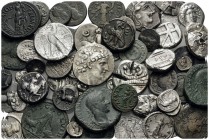 GREEK & ROMAN. . (399.78 g). Lot of Seventy Five Silver and Bronze coins representing Greek and Roman types. A very interesting grouping of large Gree...