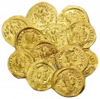 BYZANTINE. Circa 5th-6th century. (Gold, 15.69 g). Lot of 12 gold Tremisses representing Anastasius I, Justin I and Justinian I. Lovely condition and ...