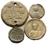 BYZANTINE. Circa 7th -11th century. (Lead, 58.63 g). Lot of Four well pressed and clear Byzantine lead seals, varied and interesting. Lot sold as is, ...