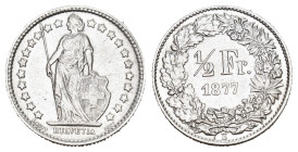 SCHWEIZ. EIDGENOSSENSCHAFT. 1/2 Franken 1877 . HMZ 1205 vorzüglich berieben 
Dieses Los unterliegt bei Auslieferung in der Schweiz der Margenbesteueru...