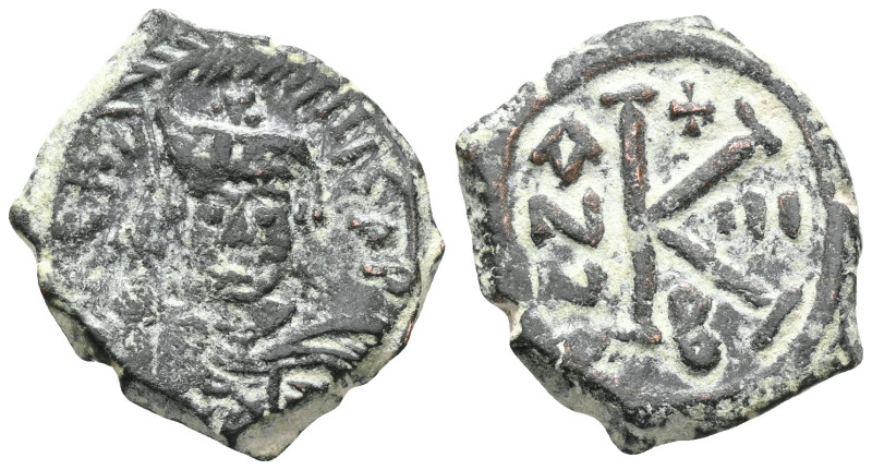 Byzantine
Maurice Tiberius. 582-602. Æ half follis . Constantinople mint, year ...