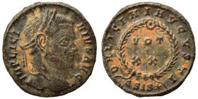 Licinius I, 308-324. Follis (bronze, 2.96 g, 18 mm), Siscia. IMP LICINIVS AVG Laureate head right. Rev. D N LICINI AVGVSTI / VOT/XX in two lines withi...