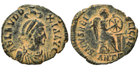 Aelia Eudoxia, 400-404. Follis (bronze, 1.66 g, 17 mm), Antioch. AEL EVDOXIA AVG diademed and draped bust right, being crowned manus Dei above. Rev. S...