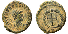 Theodosius II, 402-450. Nummus (bronze, 1.23 g, 12 mm), Antioch. D N THEODOSIVS P F AVG Pearl-diademed, draped and cuirassed bust right. Rev. Cross wi...