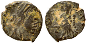 Theodosius II, 402-450. Nummus (bronze, 1.03 g, 11 mm). Pearl-diademed, draped and cuirassed bust right. Rev. Victory advancing left, holding trophy o...