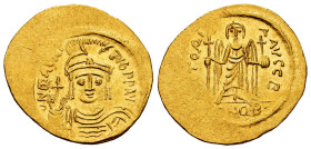 Mauricius Tiberius. Solidus. 583-601 AD. Constantinople. (MIBE-6). (Doc-5b). (Sear-478). Anv.: O N MAVRC TIЬ P P AVC, draped and cuirassed bust facing...