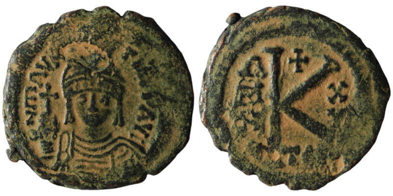 Maurice Tiberius (AD 582-602). Thessalonica
AE Half Follis (23mm, 4,72g)

Artifi...