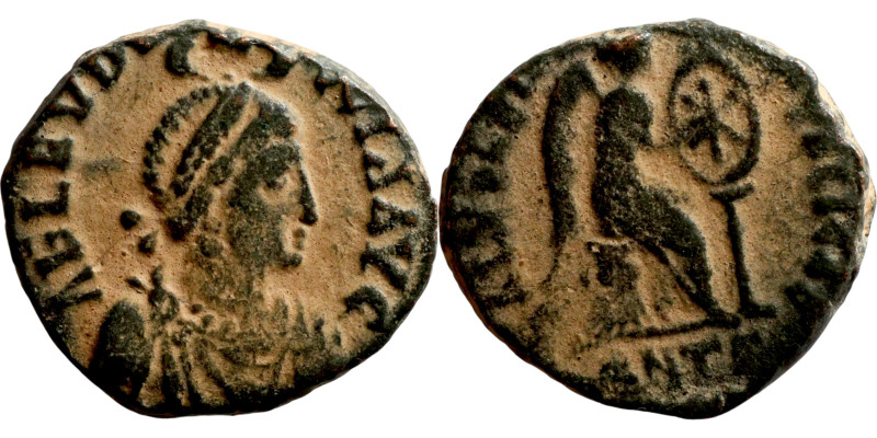 Aelia Eudoxia. (401-403 AD). Follis. Obv: AEL EVDOXIA AVG. Pearl-diademed, drape...