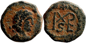 Marcian, 450-457. Nummus. D N MARCIANVS P F AV Diademed, draped and cuirassed bust right. Rev. Monogram in wreath.

9mm 1,00g