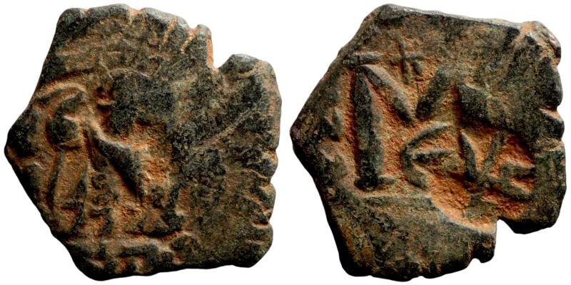 Constans II, Follis, Constantinople. Obverse: Imperial figure holding cross and ...