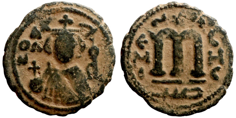 Al-Malik, Follis. Obverse: Crowned imperial bust facing, holding globus cruciger...