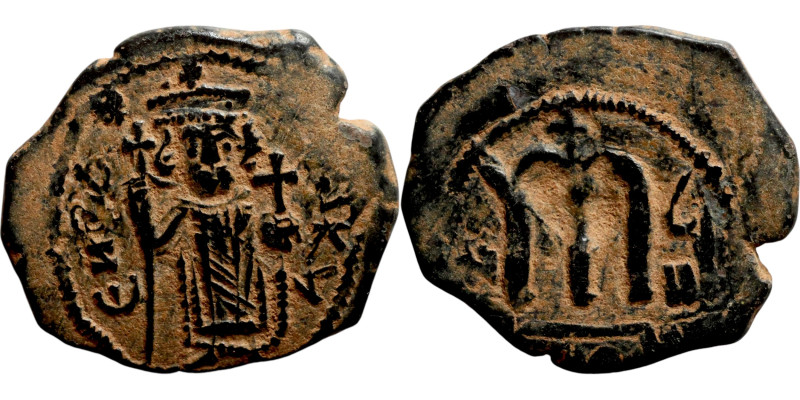 Constans II, Follis, Constantinople. Obverse: Imperial figure holding cross and ...