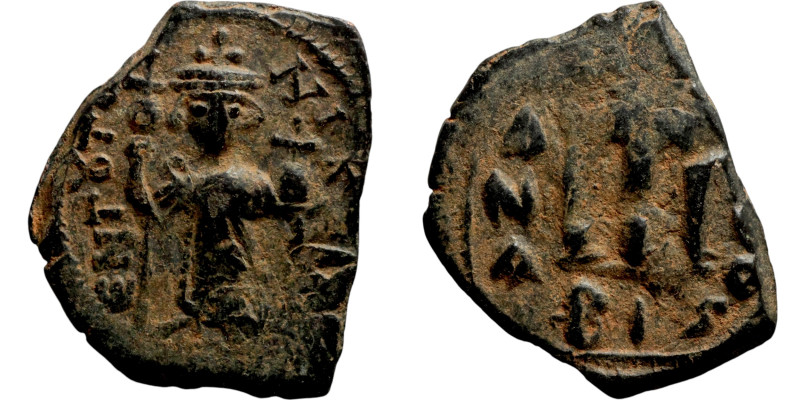 Constans II, Follis, Constantinople. Obverse: Imperial figure holding cross and ...