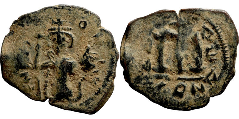 Constans II, Follis, Constantinople. Obverse: Imperial figure holding cross and ...