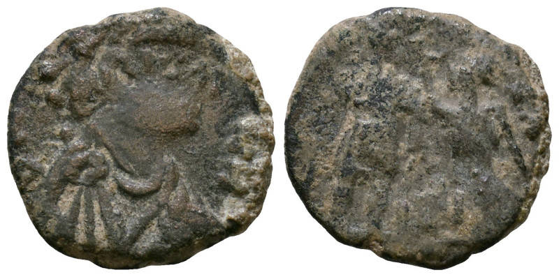 Arcadius AD 383-408. or Honorius AD 393-423. Æ 13mm, 1,54g *Repatinated*