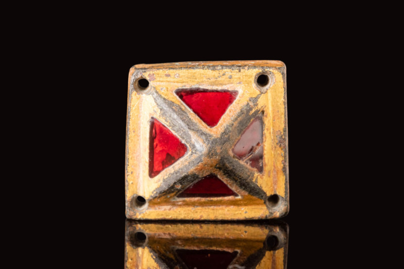 MEROVINGIAN GILT SWORD FITTING WITH RED INLAID GARNET

 Ca. AD 600 A rare Angl...