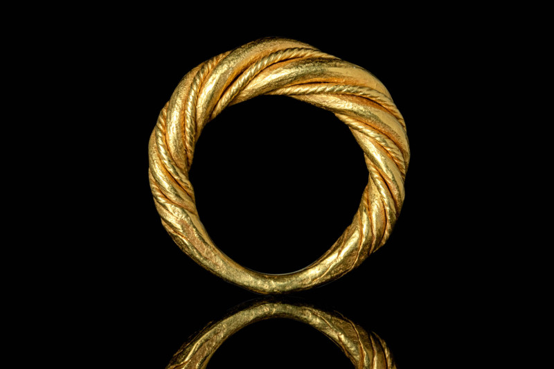 MASSIVE VIKING GOLD TWISTED RING

 Ca. AD 900 A Viking twisted 20ct gold ring ...