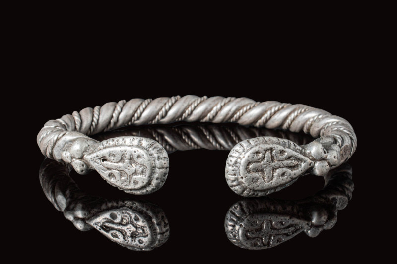 RARE VIKING TWISTED BRACELET WITH CROSSES

Ca. AD 900 - 1100 A Viking silver b...