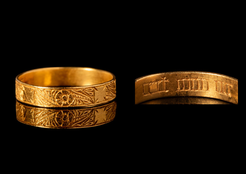 MEDIEVAL GOLD POSY RING WITH INCISED FLORAL MOTIF

 Ca. AD 1500 -1550 A mediev...