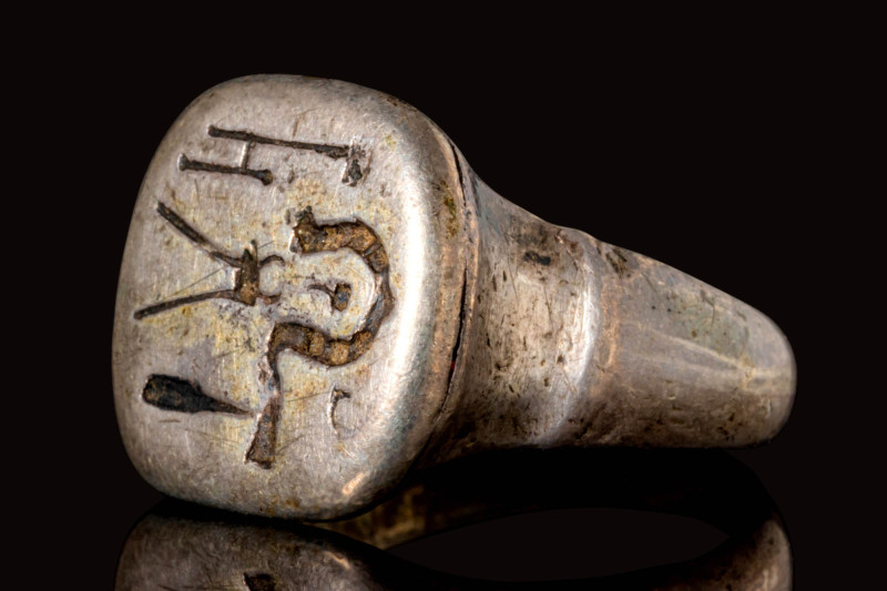 POST MEDIEVAL SILVER RING WITH MASONRY SYMBOLS

 CA. 1600 AD A post-medieval s...