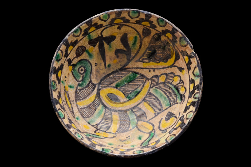 SAMANID BOWL WITH PEACOCK

 Middle East, Iran, Nishapur, Ca. 10th century AD A...