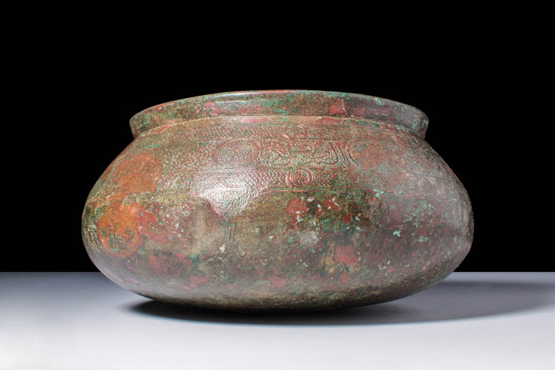 SELJUK BRONZE VESSEL WITH KUFIC INSCRIPTION

 Ca. AD 1000 - 1200 A Seljuk bron...