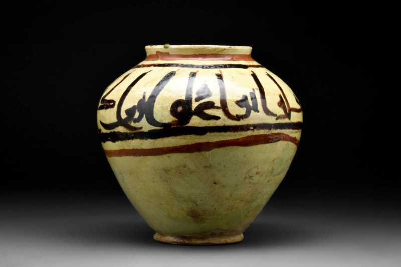 JALAYIRID DYNASTY GLAZED POTTERY JAR WITH ELONGATED NAKSH SCRIPT

 Near East p...