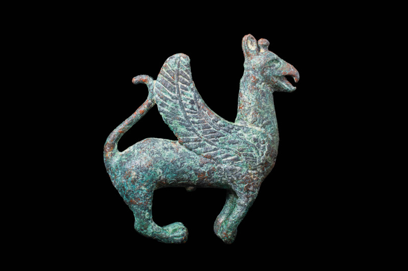 ASSYRIAN BRONZE STATUETTE OF WINGED GRIFFON

 Ca. 800 - 700 BC A solid Assyria...