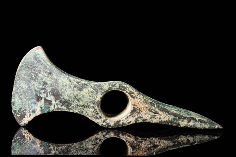 HEAVY BRONZE AGE AXE HEAD

 Ca. 1200 - 800 BC A casted Western Asiatic bronze ...