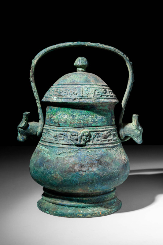 CHINESE WESTERN ZHOU BRONZE YOU WINE VESSEL

 Ca. 1046-771 BC A Western Zhou p...