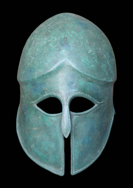 GREEK CORINTHIAN HELMET- XRF TESTED

 Ca. 600 - 575 BC A striking Corinthian h...