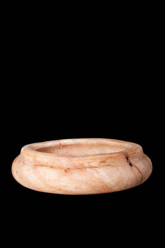 EGYPTIAN ALABASTER RIMMED BOWL

 Old Kingdom, Ca. 2750 - 2649 BC An Egyptian s...