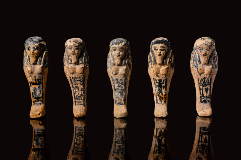 COLLECTION OF 5 EGYPTIAN FAIENCE USHABTI

Third Intermediate Period, Ca. 1069 ...