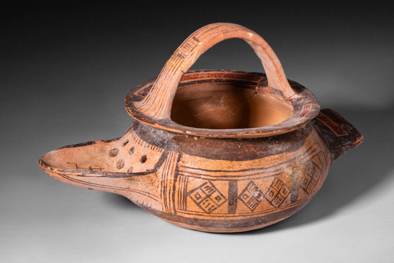 DAUNIAN TERRACOTTA VESSEL WITH STRAINER

 Ca. 500 - 400 BC A geometrical Dauni...