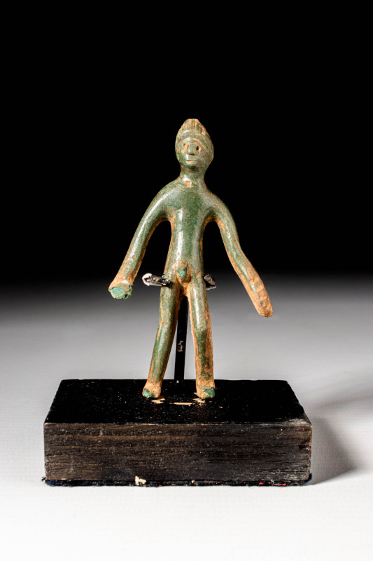 ETRUSCAN BRONZE VOTIVE IDOL

 Ca. 400 - 300 BC An Etruscan bronze votive idol ...