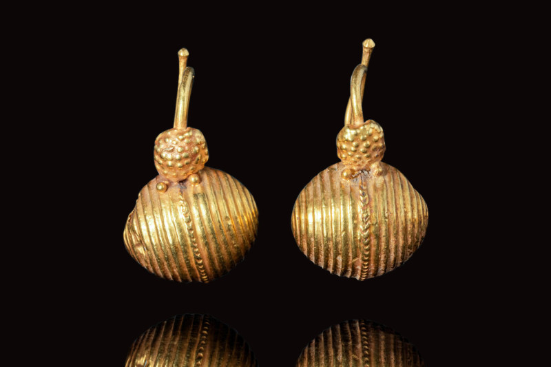 EARLY HELLENISTIC GOLD EARRINGS

 Ca. 500 - 300 BC A matching pair of Hellenis...