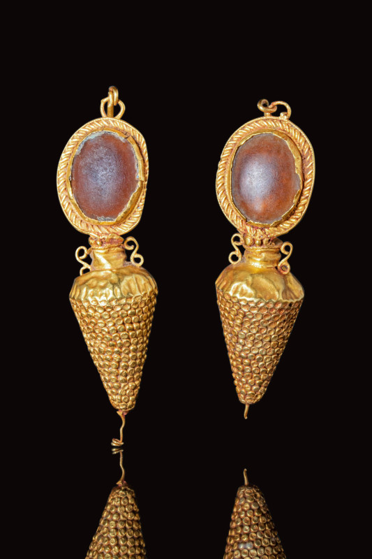 HELLENISTIC GOLD AMPHORA SHAPED EARRINGS WITH CABOCHONS

 Ca. 300 - 200 BC A p...