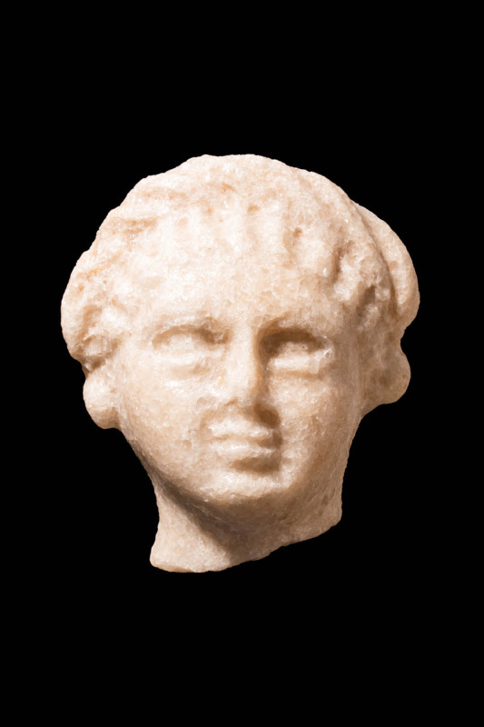 ROMAN MARBLE HEAD OF AN IMPERIAL WOMAN

 Ca. AD 100 - 300 A Roman marble head ...