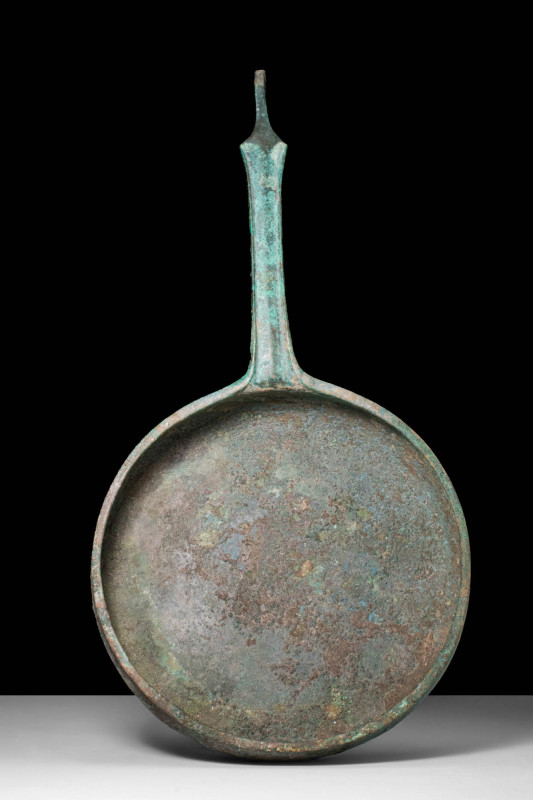 LARGE ROMAN BRONZE PATERA WITH HANDLE

 Ca. AD 100 - 300 A Roman cast-bronze p...