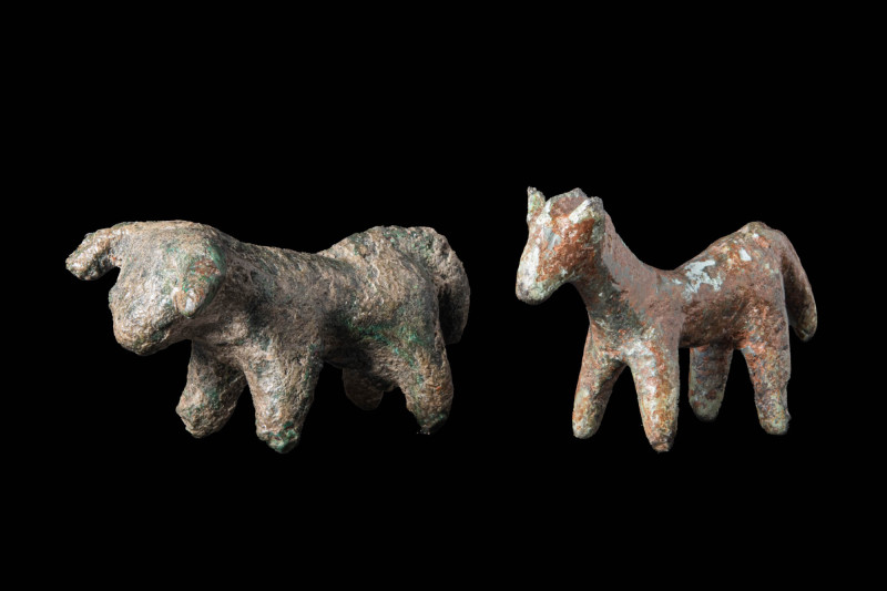 PAIR OF ROMAN BRONZE BULLS

 Ca. AD 100 - 300 A pair of Roman bronze statuette...